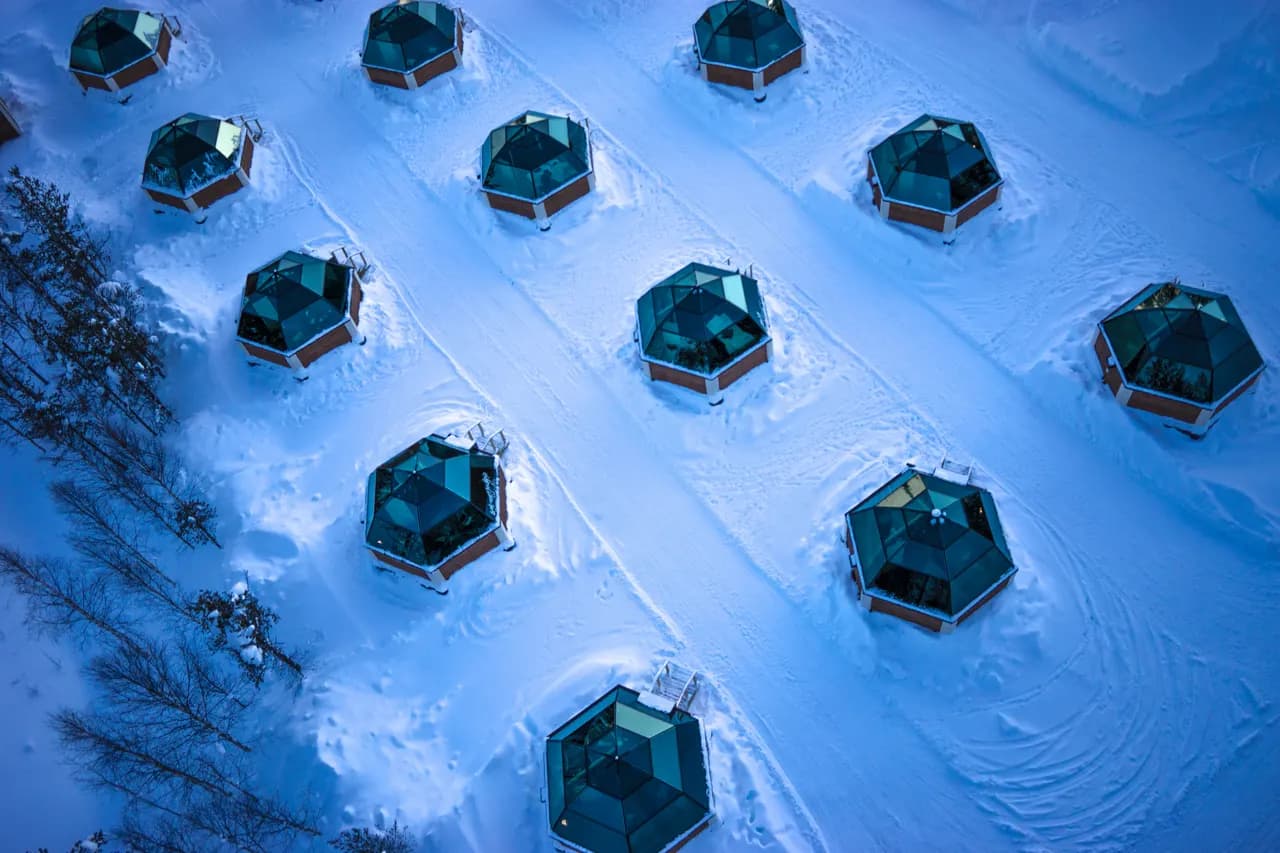Aerial view of the glass igloos at Arctic SnowHotel & Glass Igloos in winter